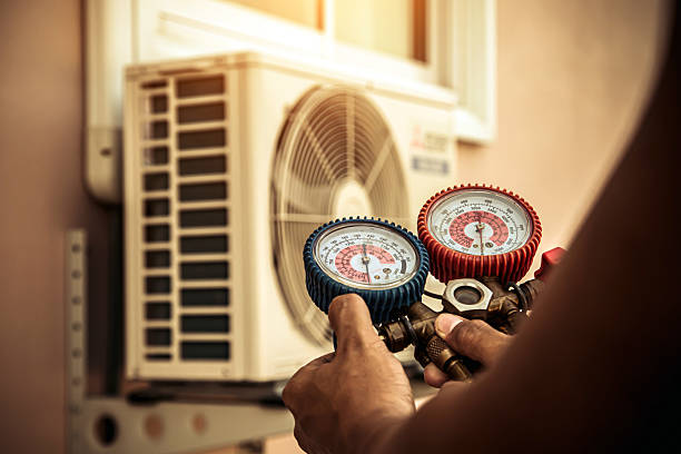 Professional Air Conditioning Service technician working in Atlanta, GA